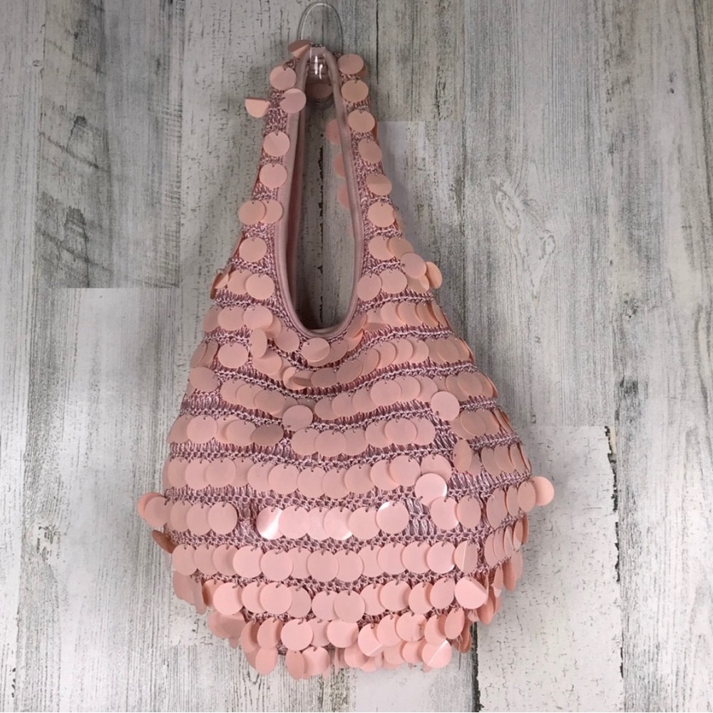 Pink woven hobo covered with large sequins